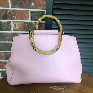 Pink leather bag bamboo handle equestrian interior
